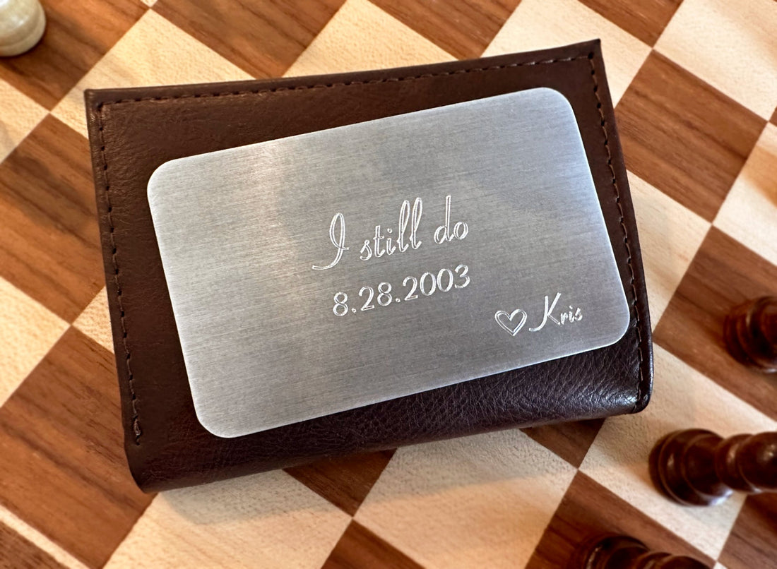 Engraved metal wallet card, a traditional anniversary gift
