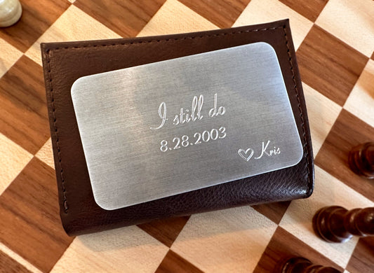 Engraved metal wallet card, a traditional anniversary gift